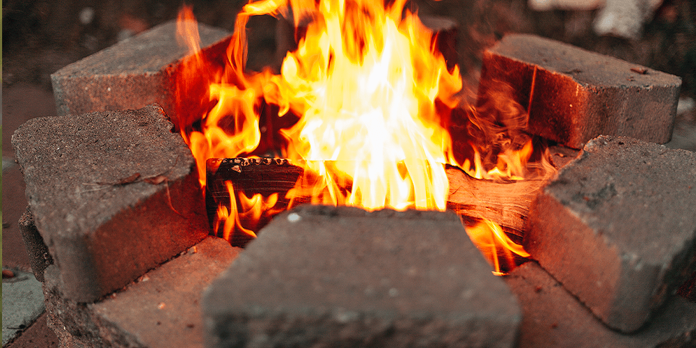 Dees’ Nursery--fire ring burning wood